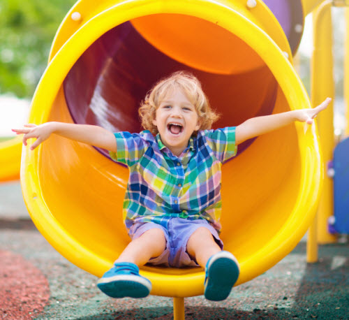 child going down a slide