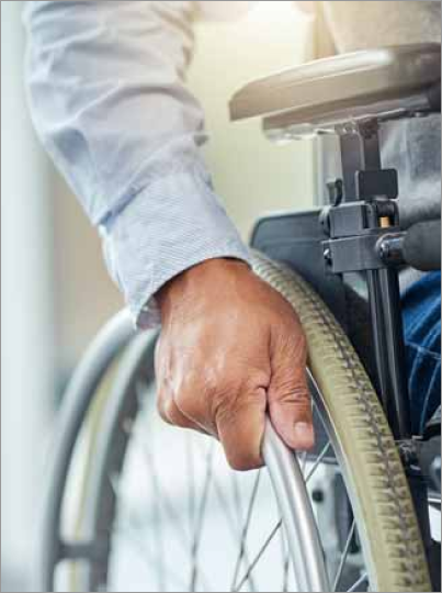 side view of a person sitting in a wheel chair