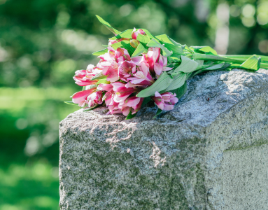 flowers on a headstone