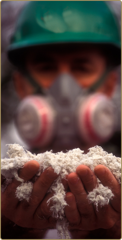 asbestos abatement worker holding asbestos fibers