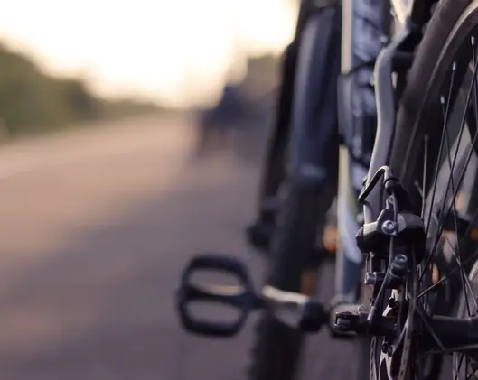 magnified image of a bicycle peddler and spoke